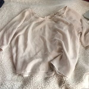 Sheer blouse with open back